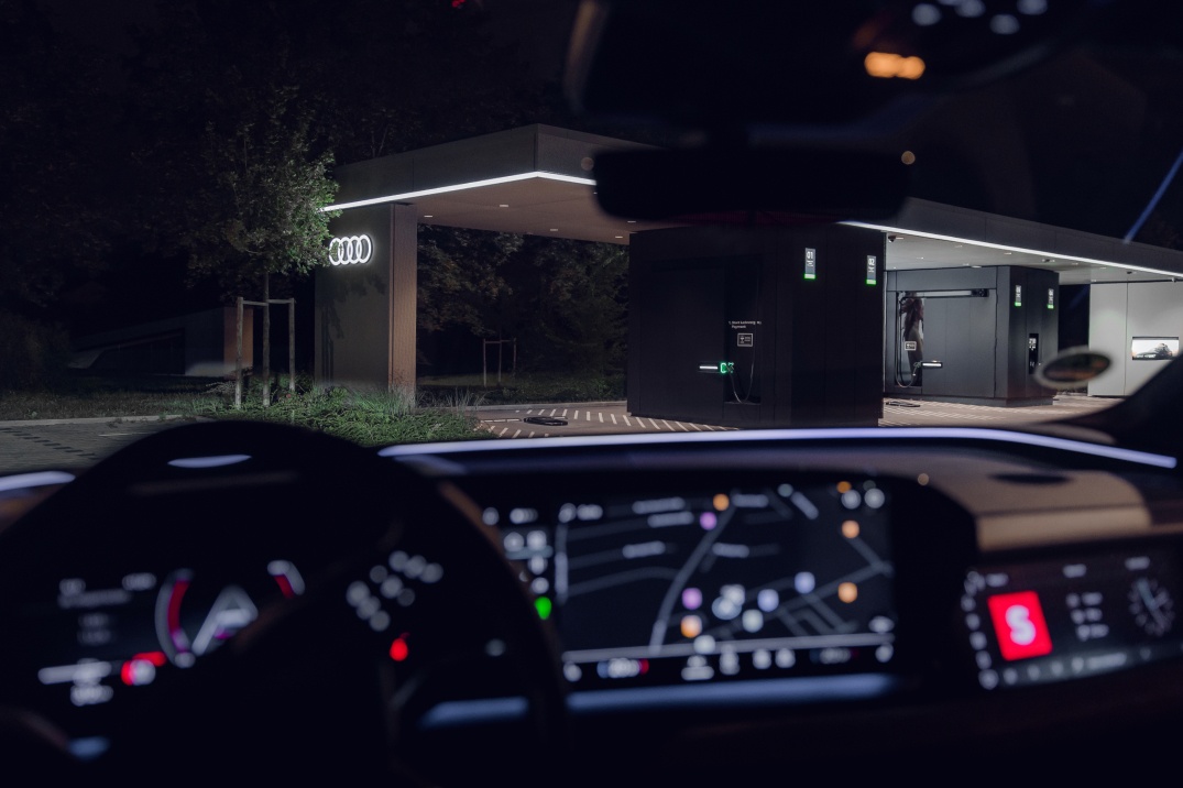 View through the windshield at an Audi charging hub.